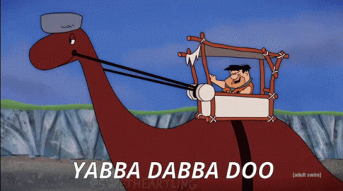 A Cartoon Of Flintstone With A Glitch Effect GIF
