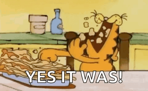 A Cartoon Of Garfield Eating A Pie With The Words `` Yes It Was ! '' GIF