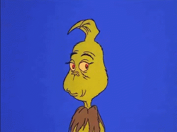 A Cartoon Of Grinch With A Very Angry Look On His Face Against A Blue Background . GIF