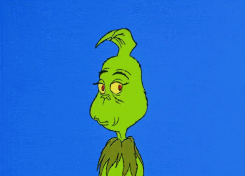 A Cartoon Of Grinch With A Very Angry Look On His Face GIF