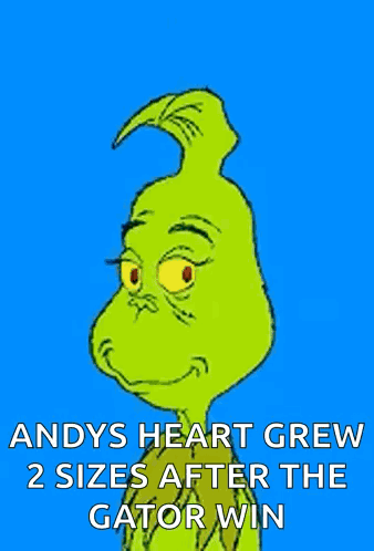 A Cartoon Of Grinch With The Caption Andy 'S Heart Grew 2 Sizes After The Gator Win . GIF