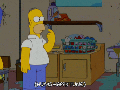 A Cartoon Of Homer Simpson Holding A Laundry Basket And Saying " Hums Happy Tune " GIF