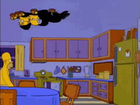 A Cartoon Of Homer Simpson Holding A Piece Of Cheese With The Caption Sixty-Four Slices Of American Cheese GIF