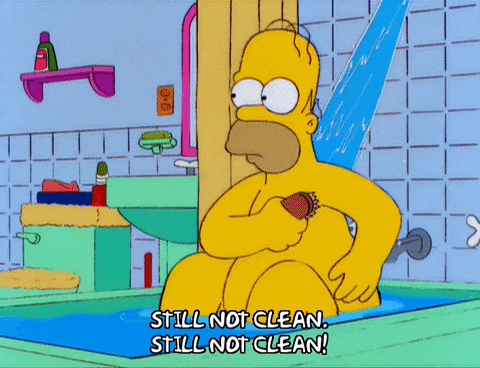 A Cartoon Of Homer Simpson Taking A Shower And Saying Still Not Clean Still Not Clean GIF