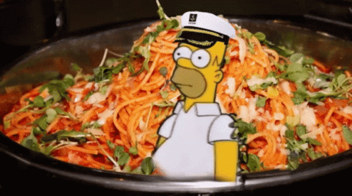 A Cartoon Of Homer Simpson Wearing A Captain 'S Hat Stands In Front Of A Bowl Of Carrots GIF