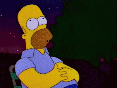 A Cartoon Of Homer Simpson With His Arms Crossed GIF