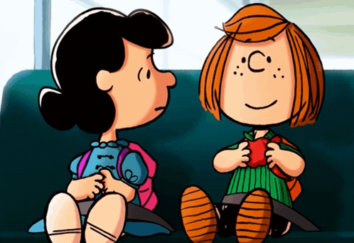 A Cartoon Of Lucy And Patty From Peanuts Sitting Next To Each Other On A Couch GIF