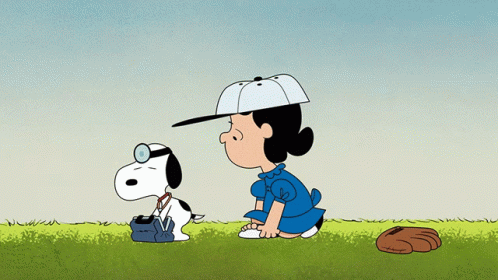 A Cartoon Of Lucy And Snoopy With A Baseball Glove On The Ground GIF