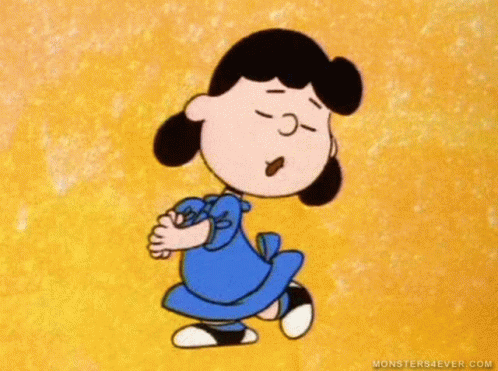 A Cartoon Of Lucy Brown From The Peanuts Movie Is Dancing . GIF