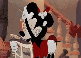 A Cartoon Of Mickey Mouse Holding A Newspaper That Says ' Straits ' On It GIF