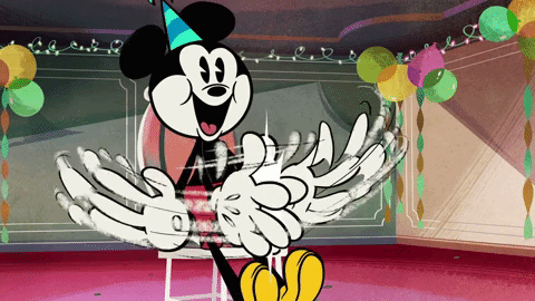 A Cartoon Of Mickey Mouse Wearing A Party Hat And Gloves GIF