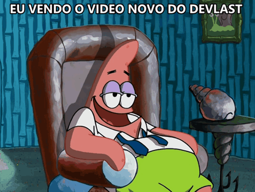 A Cartoon Of Patrick Star Sitting In A Chair With The Words Eu Vendo O Video Novo Do Devlast Above Him GIF