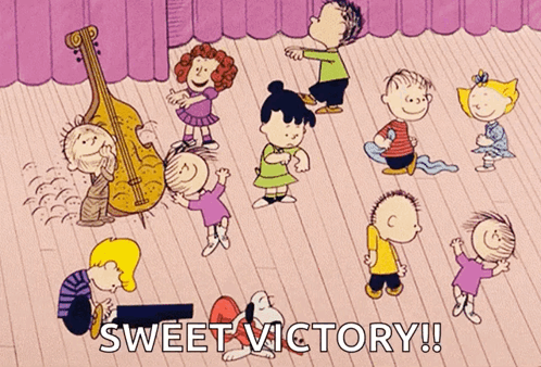 A Cartoon Of Peanuts Dancing With The Words Sweet Victory Written Below Them GIF