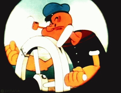 A Cartoon Of Popeye Holding A Steering Wheel GIF