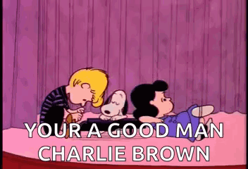 A Cartoon Of Snoopy And Lucy Laying On A Bed With The Words Your A Good Man Charlie Brown GIF