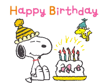a cartoon of snoopy blowing out candles on a cake