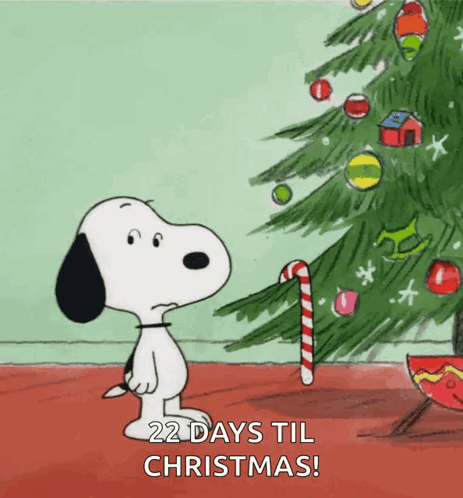 A Cartoon Of Snoopy Looking At A Christmas Tree With The Words 22 Days Till Christmas GIF
