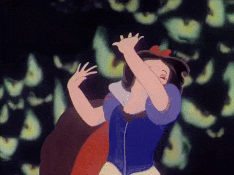 A Cartoon Of Snow White Is Dancing In Front Of A Glowing Background GIF