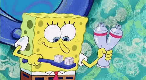 A Cartoon Of Spongebob Brushing His Teeth While Holding Two Tubes Of Toothpaste GIF