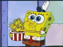 A Cartoon Of Spongebob Eating French Fries From A Bucket GIF