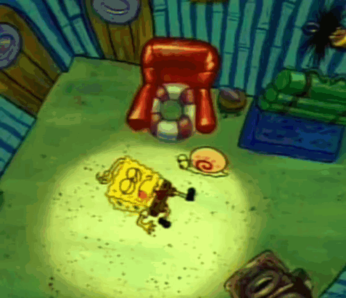 A Cartoon Of Spongebob Laying On The Floor Next To A Chair GIF