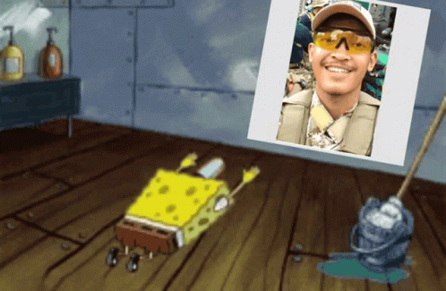 A Cartoon Of Spongebob Laying On The Floor Next To A Picture Of A Man In A Military Uniform GIF