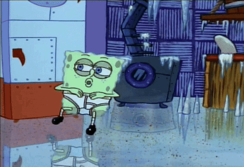 A Cartoon Of Spongebob Sitting In Front Of A Washing Machine With Icicles On It GIF