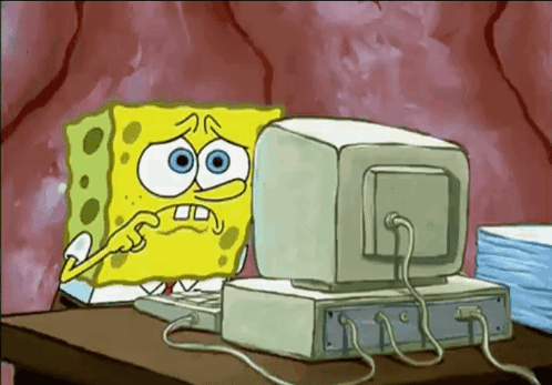 A Cartoon Of Spongebob Squarepants Looking At A Computer Monitor GIF
