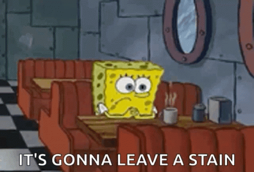 A Cartoon Of Spongebob Squarepants Sitting At A Table In A Diner . GIF