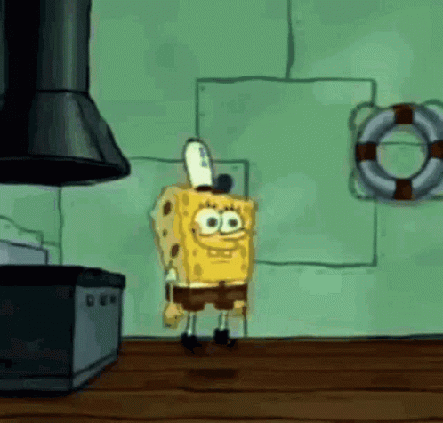 A Cartoon Of Spongebob Squarepants Standing In A Kitchen . GIF
