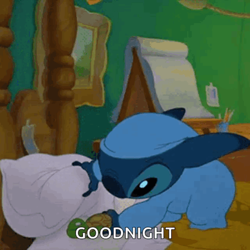 A Cartoon Of Stitch Laying On A Bed With The Words Goodnight Below Him GIF