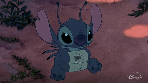 A Cartoon Of Stitch With The Words " Ohana Means Family " Below Him GIF