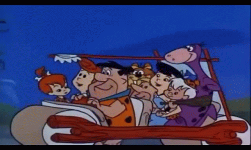 A Cartoon Of The Flintstones Driving A Car GIF