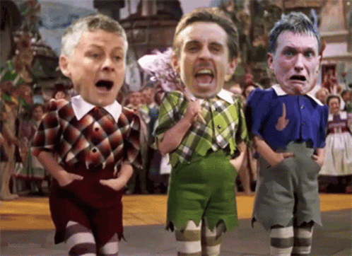 A Cartoon Of Three Men Standing Next To Each Other With Their Faces On Their Shirts GIF
