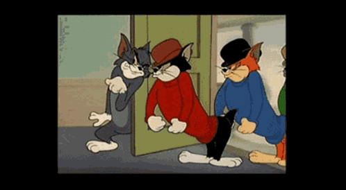 A Cartoon Of Tom And Jerry Standing Next To Each Other In Front Of A Door . GIF