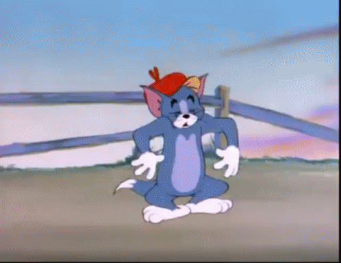A Cartoon Of Tom Wearing A Hat With A Chicken On It GIF