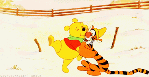 A Cartoon Of Winnie The Pooh And Tigger Hugging In The Snow GIF