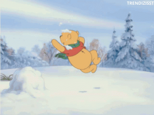 A Cartoon Of Winnie The Pooh Playing In The Snow With The Words Trendizisst Below Him GIF