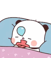 a cartoon panda bear is sleeping in a bed with a speech bubble above his head .