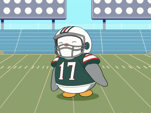 A Cartoon Penguin Wearing A Football Uniform With The Number 17 GIF