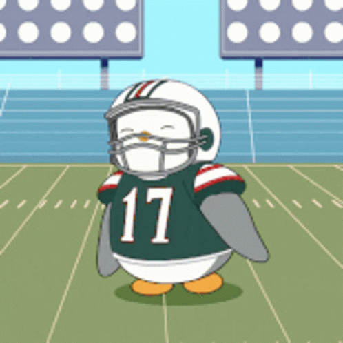 a cartoon penguin wearing a helmet and number 17 jersey