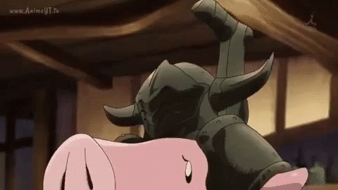 A Cartoon Pig Is Laying On Top Of A Statue Of A Bull . GIF