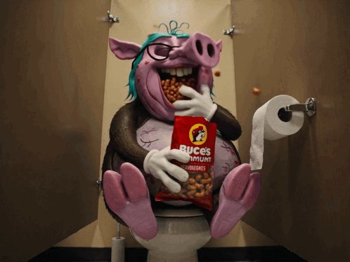 A Cartoon Pig Is Sitting On A Toilet With A Bag Of Buces In His Mouth GIF