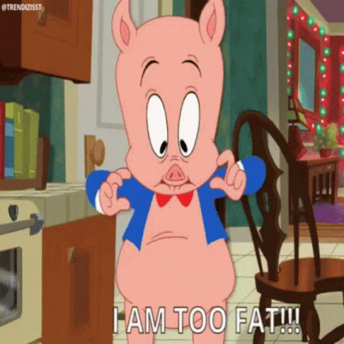 A Cartoon Pig Says I Am Too Fat While Standing In A Kitchen GIF