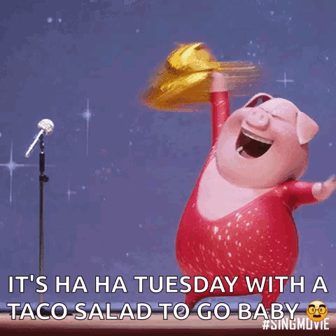 A Cartoon Pig Singing Into A Microphone While Holding A Taco Salad GIF