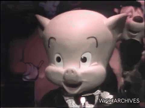 A Cartoon Pig With Wpix Archives On The Bottom Right GIF