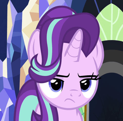 A Cartoon Pony With Purple Hair And A Horn Looks Sad GIF