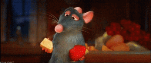 A Cartoon Rat Is Holding A Strawberry And A Piece Of Cheese GIF