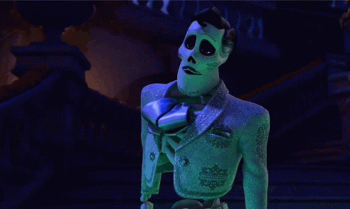 A Cartoon Skeleton In A Blue Suit And Tie GIF