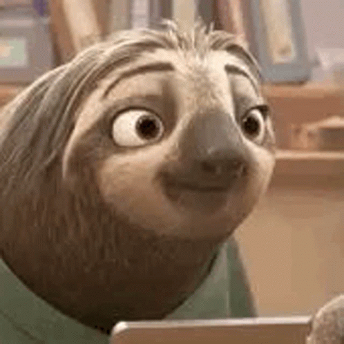 A Cartoon Sloth Is Smiling And Looking At A Tablet . GIF